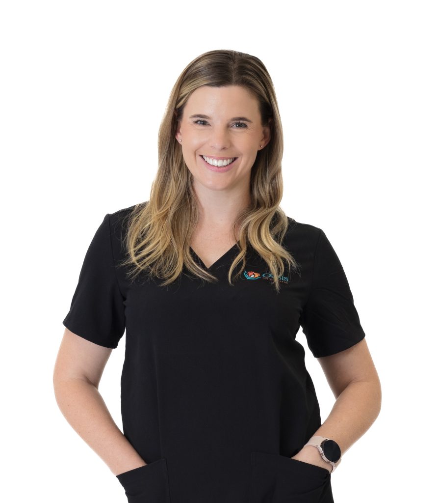 A smiling fertility doctor from Oasis Fertility Clinic